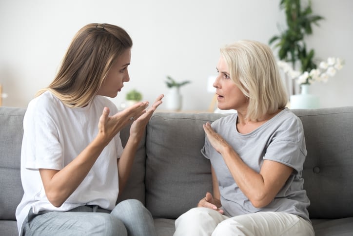 daughter having a difficult conversation with her mother